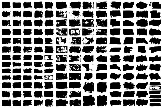 Variety of abstract black ink brush strokes on white background.