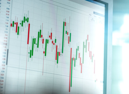 Stock market data on device screen at office
