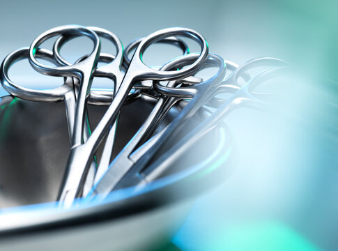Surgical instruments, surgical scissors in a kidney shaped dish