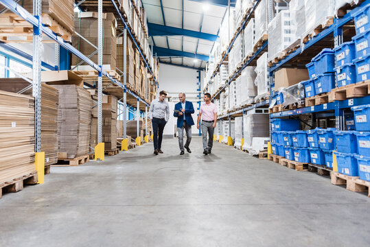Business people meeting in company storehouse