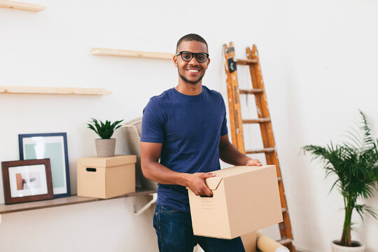 Young man moving in