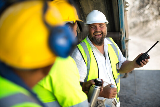 Quarry workers wearing protective clothing
