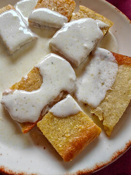Traditional Flija Dish with Sour Cream Sauce