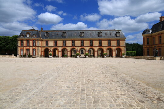Dampierre-en-Yvelines, France - May 21, 2026. The historic Ch&acirc;teau de Dampierre, former residence of the Dukes of Luynes, in the heart of the Chevreuse Valley, France