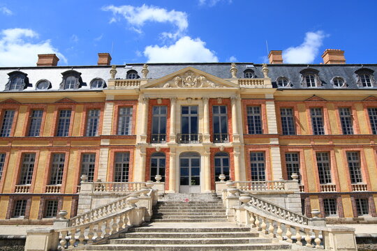 Dampierre-en-Yvelines, France - May 21, 2026. The historic Ch&acirc;teau de Dampierre, former residence of the Dukes of Luynes, in the heart of the Chevreuse Valley, France