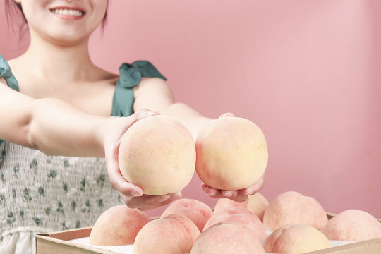 Fresh Juicy Peaches in Hands - Yangshan Variety from Wuxi