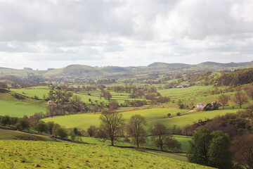 Rolling Green Valley with Stone Farmhouse in the Peak District Spring © Hazza567