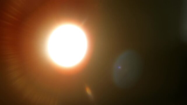 Real Bright Lens Flare with Bokeh Multi Iris Texture on Black Background. Use blend mode screen, add, overlay on footage for graphic texture. 4K.