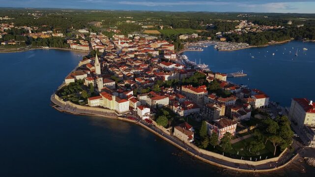 Porec old town in Croatia during a warm summer evening. Beautiful Mediterranean coastal panorama.