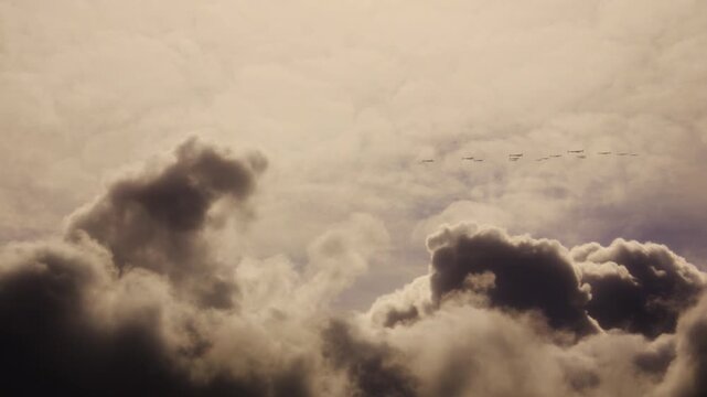 Fast Flying Shahed 136 Kamikaze Drones Flying By to Target with Dramatic Cloud Sky Background. UAV Unmanned Aerial Vehicle. Modern Technology Warfare in the Air. Combat Aircraft. 3D Render.