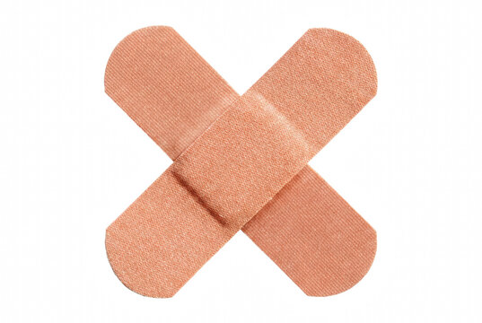 Two adhesive bandages crossed in an X shape