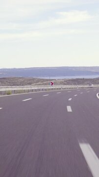POV driving on three line highway