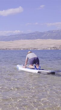 Going in to water with sup board