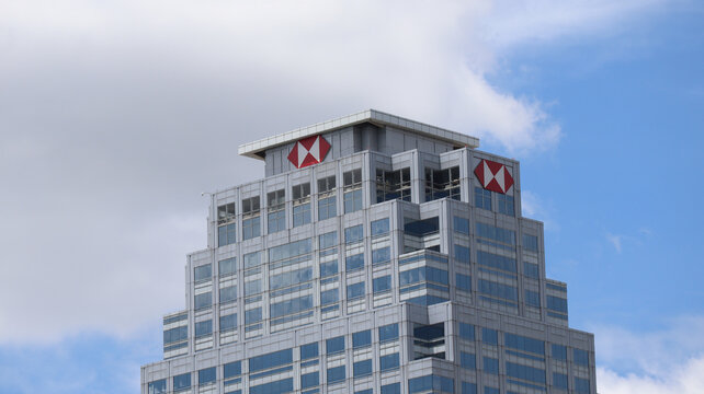 Modern Skyscraper Building with HSBC Corporate Logo Against a Blue Sky on June 28 2026 in Bangkok, Thailand.