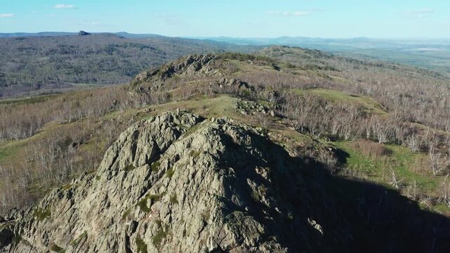 Southern Urals in spring: Yanguziai mountain of the Irendyk ridge. Aerial view.
