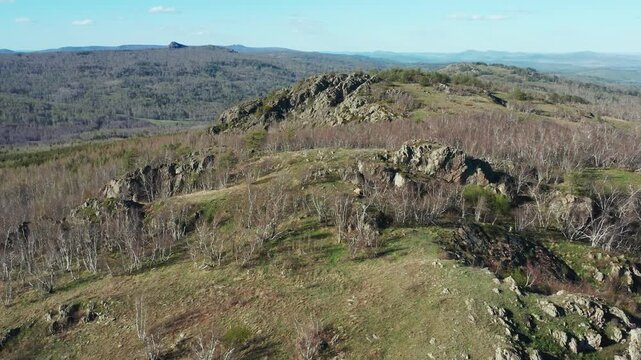 Southern Urals in spring: Yanguziai mountain of the Irendyk ridge. Aerial view.