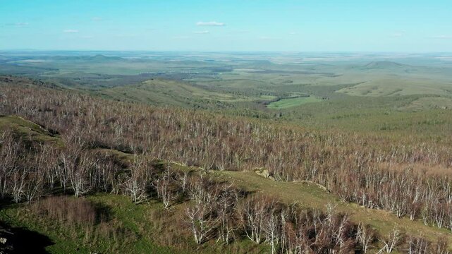 Southern Urals in spring: Yanguziai mountain of the Irendyk ridge. Aerial view.
