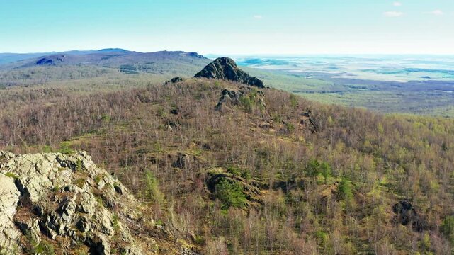 Southern Urals in spring: Yanguziai mountain of the Irendyk ridge. Aerial view.