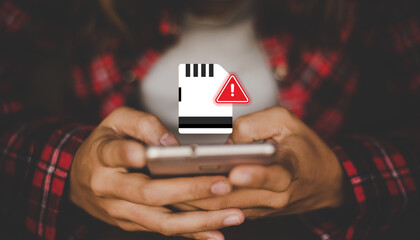 Memory Error Warning on Smartphone While User Holding Mobile Phone in Hands © Divyesh