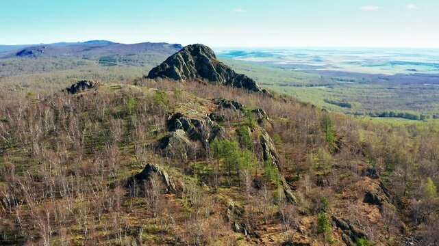 Southern Urals in spring: Yanguziai mountain of the Irendyk ridge. Aerial view.