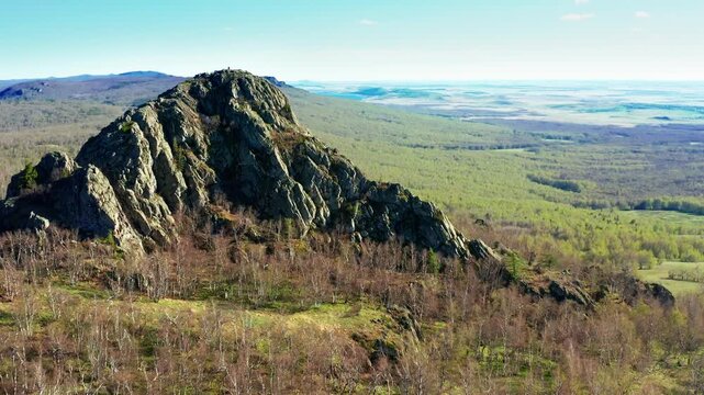 Southern Urals in spring: Yanguziai mountain of the Irendyk ridge. Aerial view.