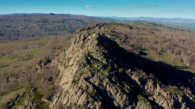 Southern Urals in spring: Yanguziai mountain of the Irendyk ridge. Aerial view.
