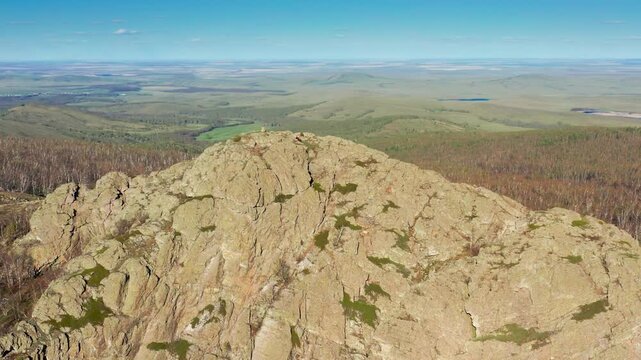 Southern Urals in spring: Yanguziai mountain of the Irendyk ridge. Aerial view.