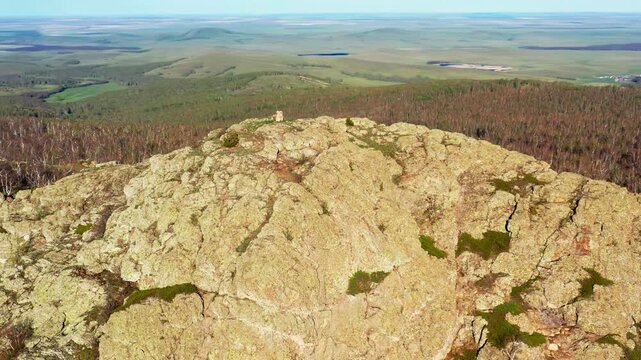 Southern Urals in spring: Yanguziai mountain of the Irendyk ridge. Aerial view.