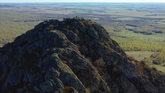 Southern Urals in spring: Yanguziai mountain of the Irendyk ridge. Aerial view.