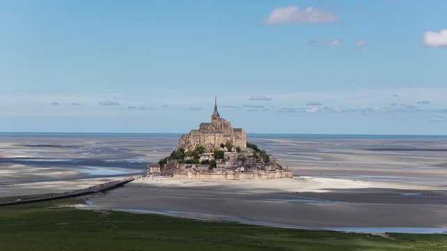Mont Saint-Michel tidal island medieval abbey in Normandy, France during reflux tide