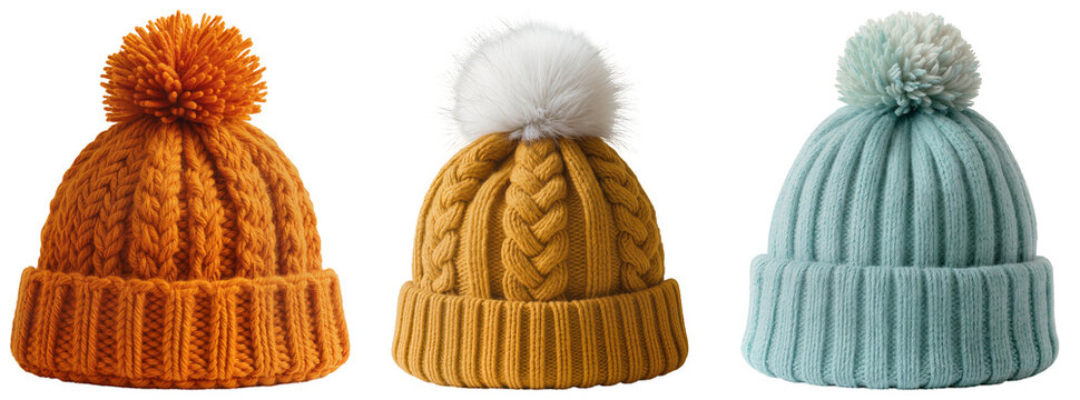 Three knitted winter hats with pom-poms in orange, mustard yellow, and light blue, isolated on a white background.