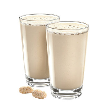 Two creamy smoothies in clear glasses with complementary supplements isolated on white background