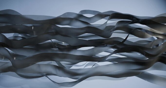 3D animation is an abstract undulating composition of many thin ribbons of silver-colored fabric on a deep black background. Smooth, swirling streams intertwine with each other, creating a sense of dy