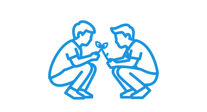 Two people squatting and interacting with each other.