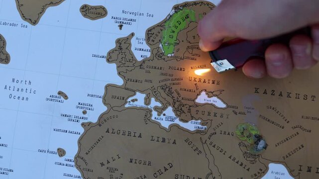 Burning flame over Ukraine on a world map symbolizing the ongoing war humanitarian tragedy geopolitical instability and the urgent need for lasting peace