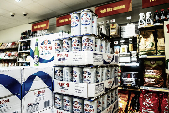  Pile or Stack of Italian Peroni Alcoholic Beer Cans In a Supermarket With No People
