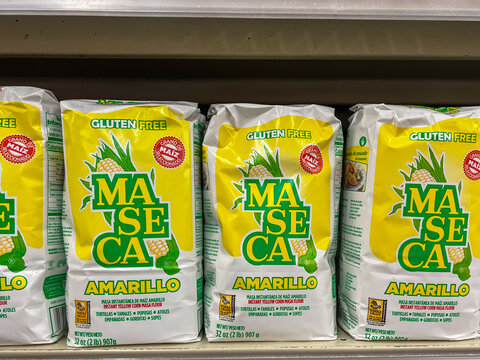 Texas, USA - April 15, 2024: Maseca Amarillo instant yellow corn masa flour bags on the store shelves in a supermarket. Texas, USA. 