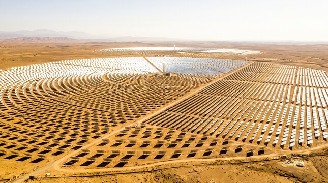 Aerial View of Massive Concentrated Solar Power Plant Station in Desert Landscape