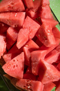 Close up of fresh slices of juicy watermelon from above.