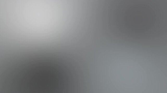 Seamless loop of smooth vertical silver grey mesh gradient. A clean, sophisticated, and minimalist background
