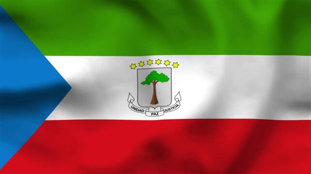 Equatorial Guinea flag on wavy fabric, top view. Realistic textile with green, white, red stripes, blue triangle, and central coat of arms.