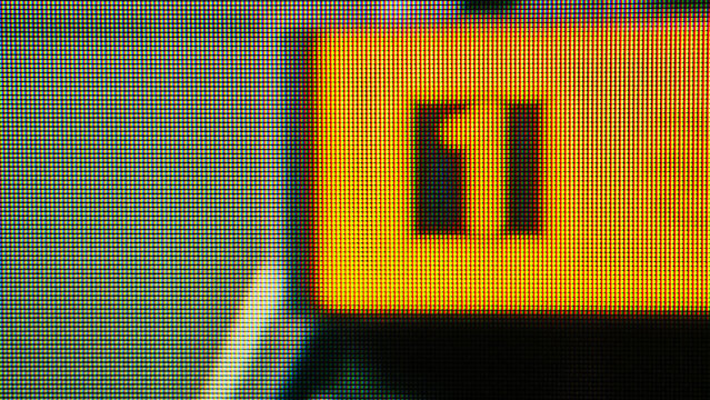 Display screen showing pixel grid and number