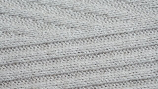 Textured knit fabric, grey cotton dress close up. High quality 4k footage