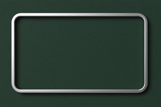 A blackboard with a metal frame on a gray background