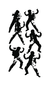 Silhouette of dancers performing on stage with dramatic lighting in black and white artistic scene for entertainment and performance themes