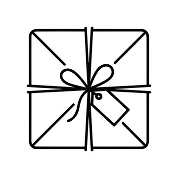Gift box with ribbon and tag.
