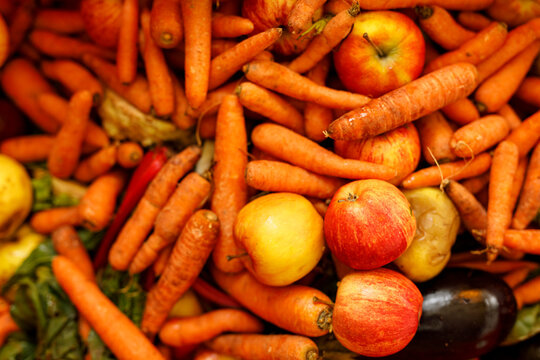 A bountiful mix of fresh organic vegetables and fruits for healthy eating.
