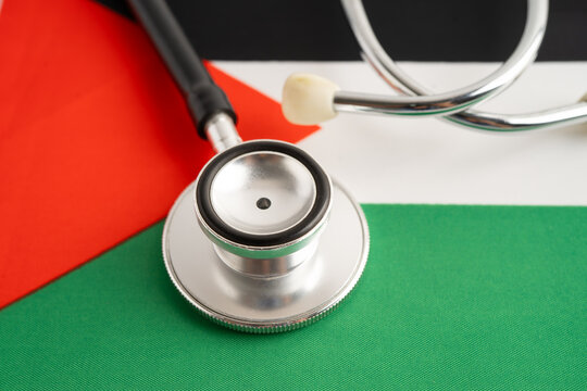 Stethoscope on Palestine flag, business and finance.