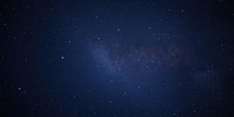 Fototapeta premium Starry night sky with the Milky Way galaxy visible