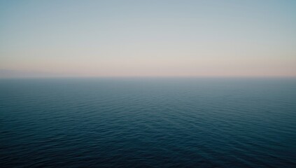 Fototapeta premium Calm ocean surface during twilight hours
